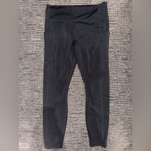 Women’s Fabletics Motion365+ Black Leggings. Large short.